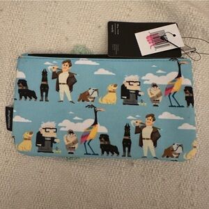 Pixar Disney Up coin purse with Dug, Carl, Kevin, and others. By loungefly